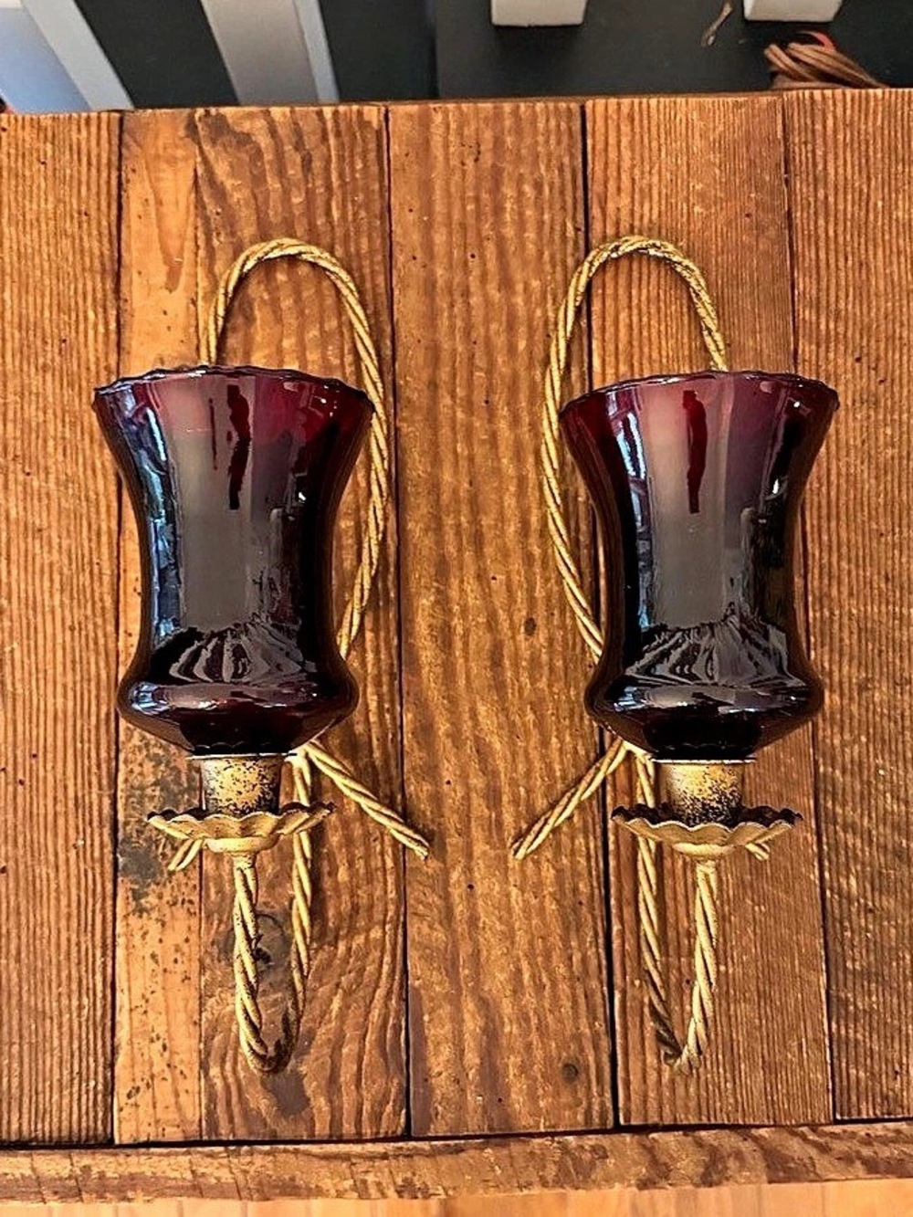Pair of vintage Homco twisted wire gold-tone wall sconces with red votive cups